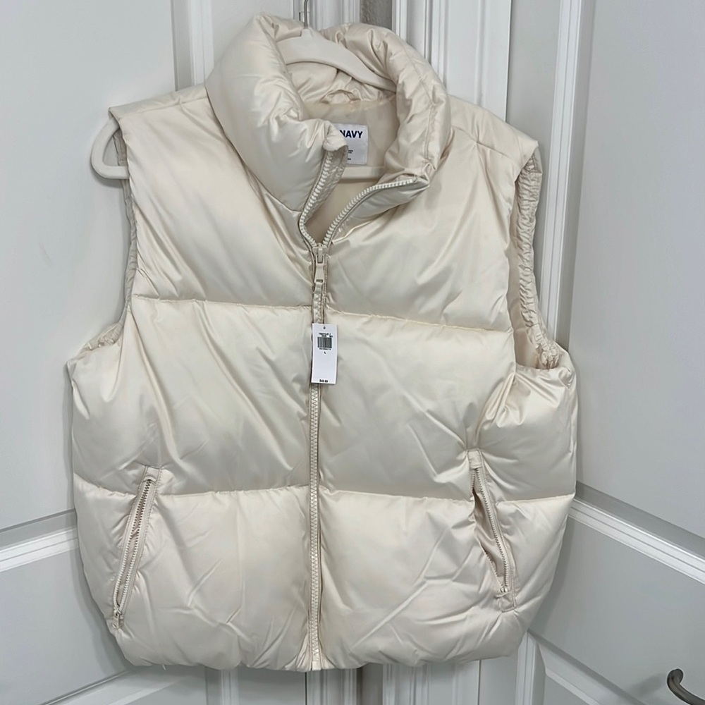 Old Navy puffer vest.  Brand new with tags.  Women’s size large.  Cream color.